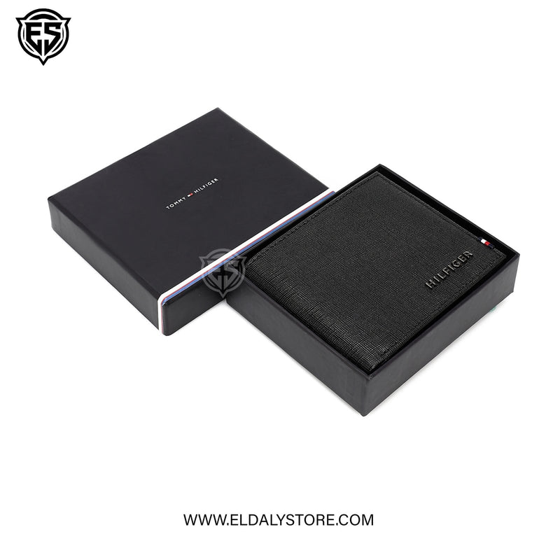 Tommy Hilfiger Woven or Canvas Bifold Wallet.