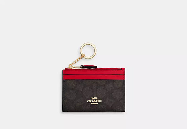 Mini Skinny Id Case In Signature Canvas