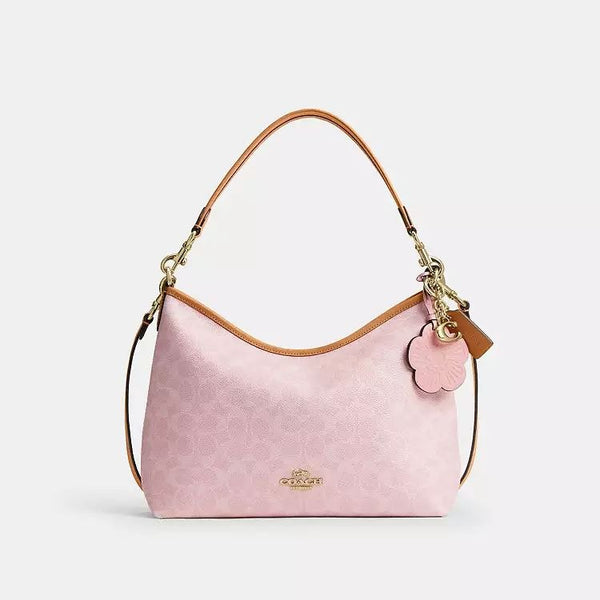 Laurel Shoulder Bag
In Signature Canvas With Charms