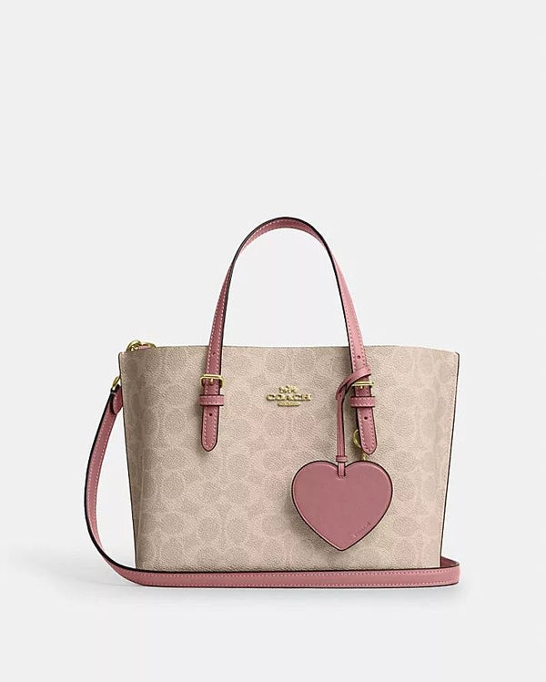 MOLLIE TOTE BAG 25 IN SIGNATURE CANVAS WITH HEART CHARM