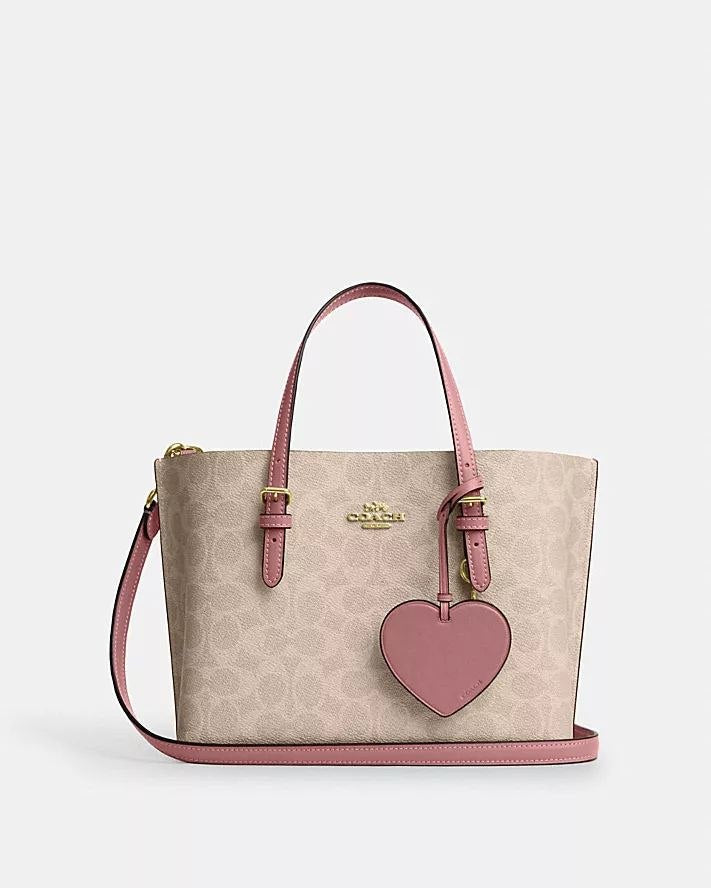 MOLLIE TOTE BAG 25 IN SIGNATURE CANVAS WITH HEART CHARM