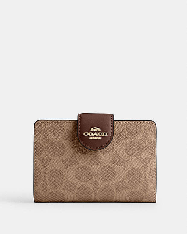 Coach Medium Corner Zip Wallet In Signature Canvas in tan brown